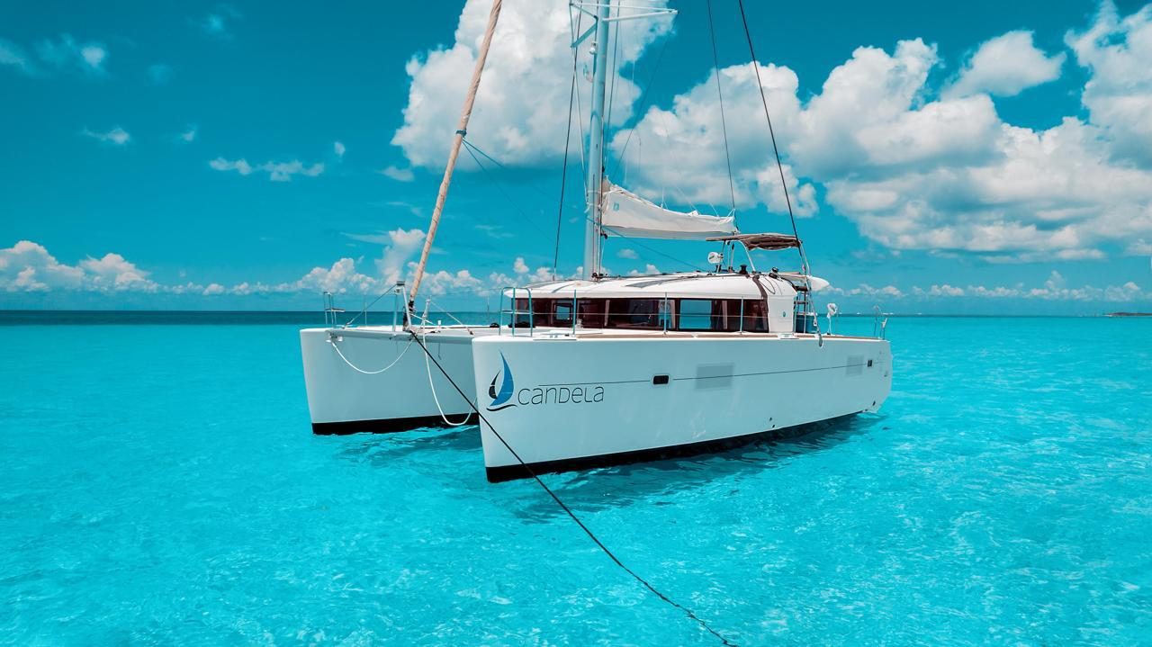 Candela anchored over turquoise water