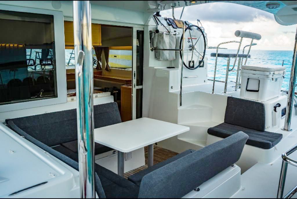 The shaded cockpit with seating and a table