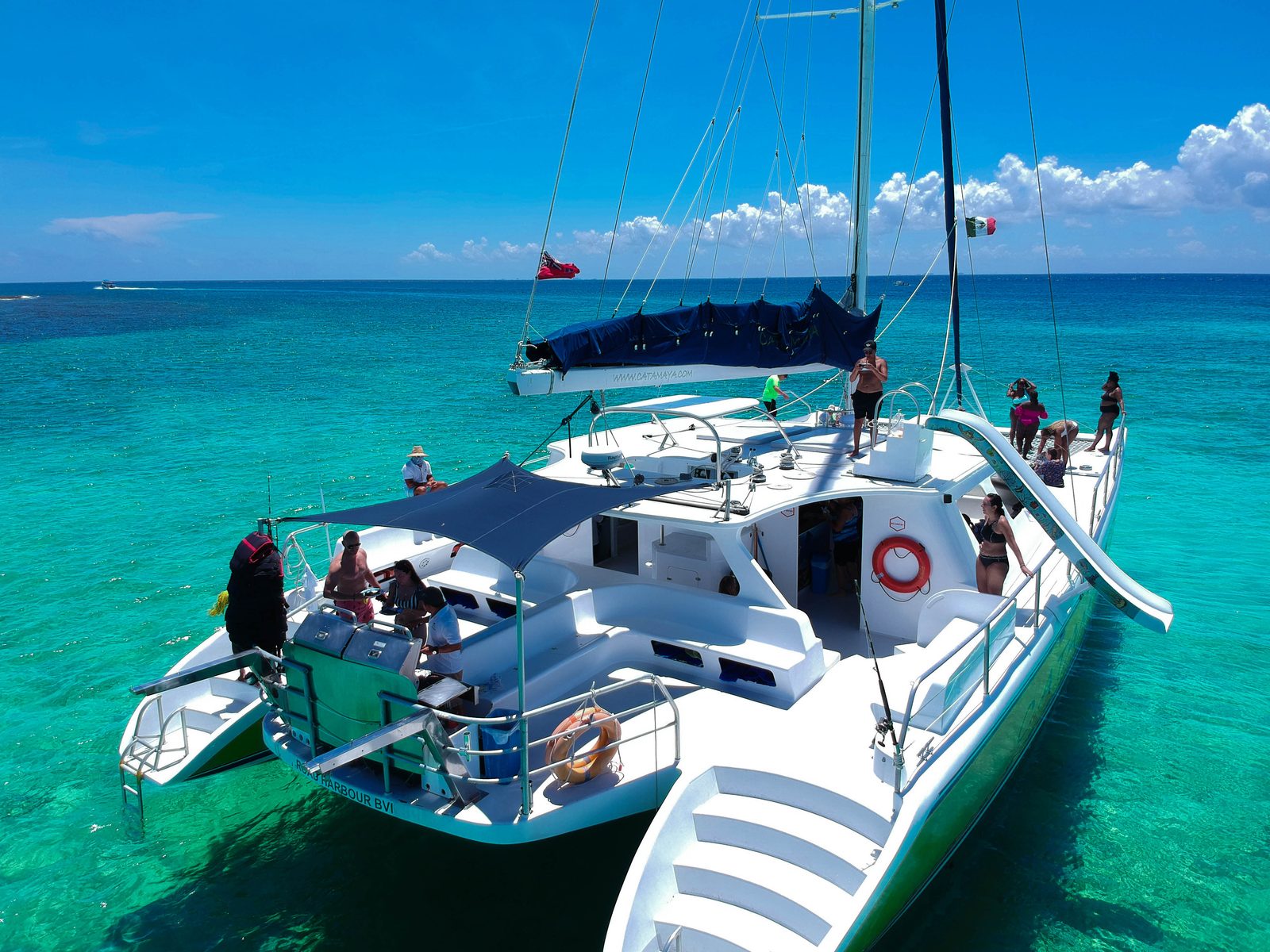 The 65-ft private sailing catamaran and its water slide, seen from the air