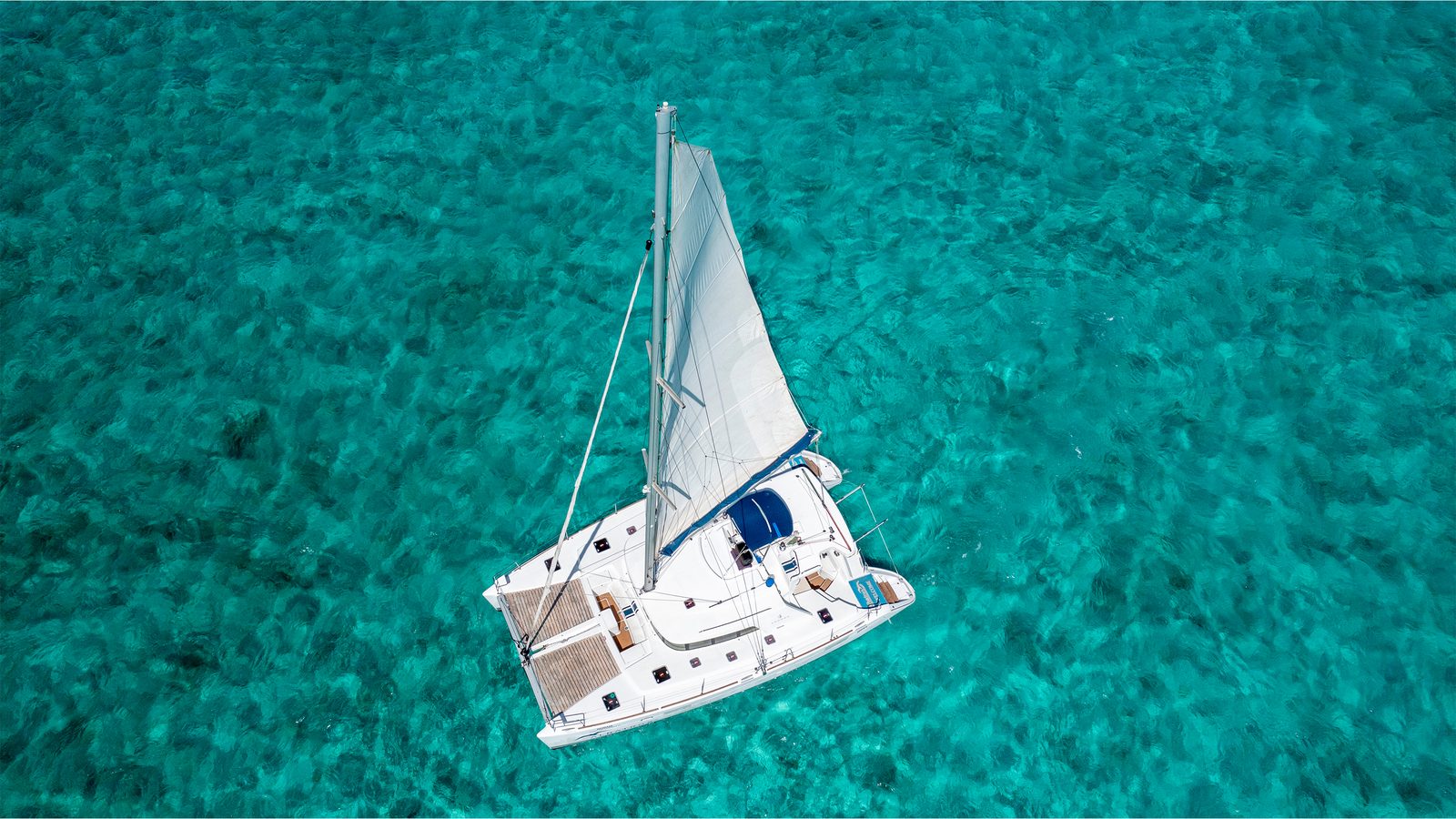 Aerial view of Quidam with its sails up
