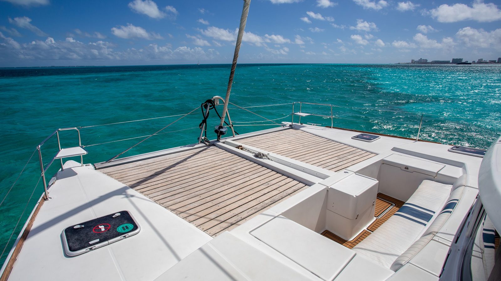 The bow deck with Cancún on the horizon