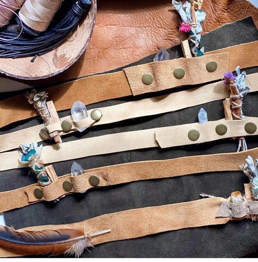 Leather bands with stones and feathers