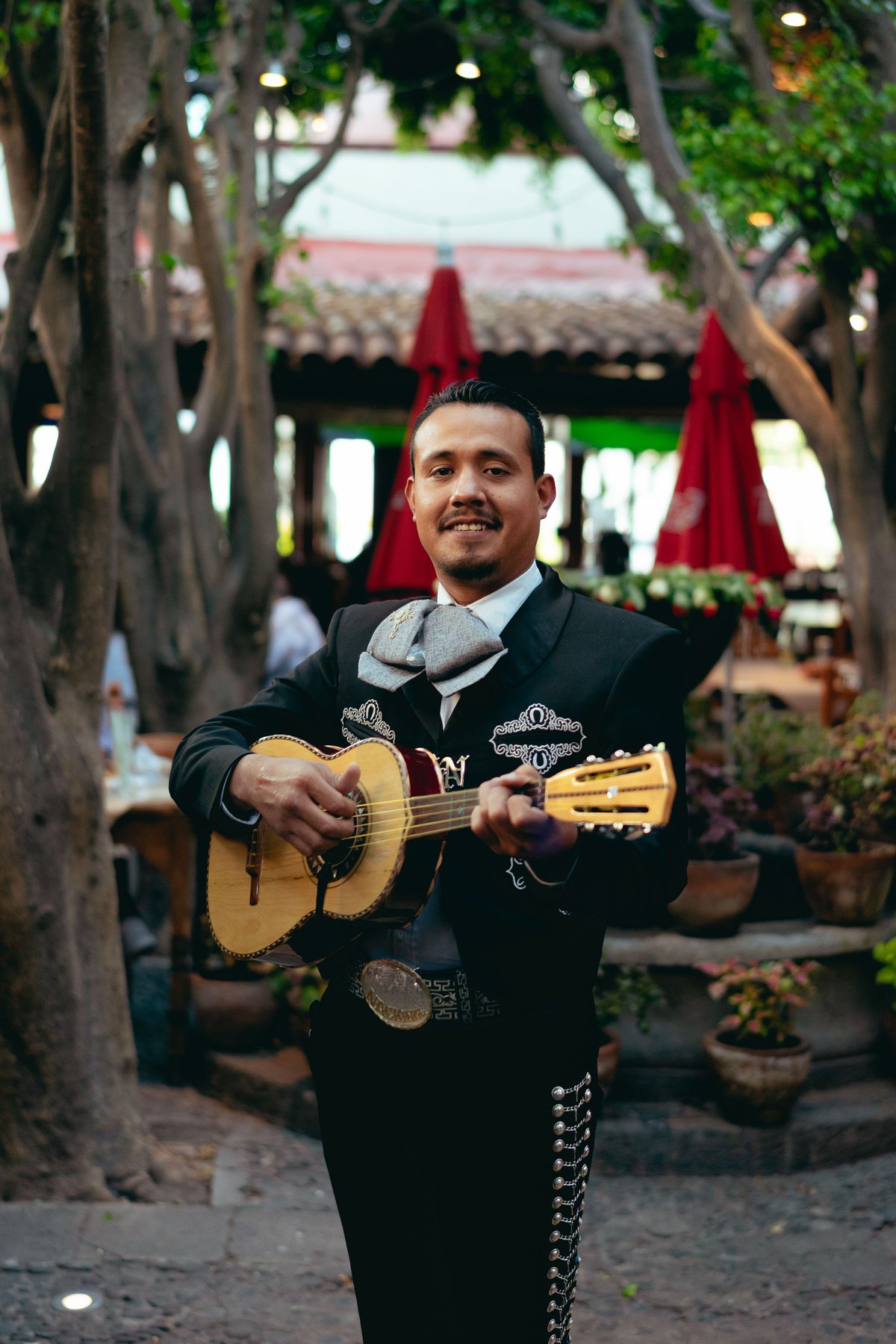 A mariachi with his guitarrón before the set