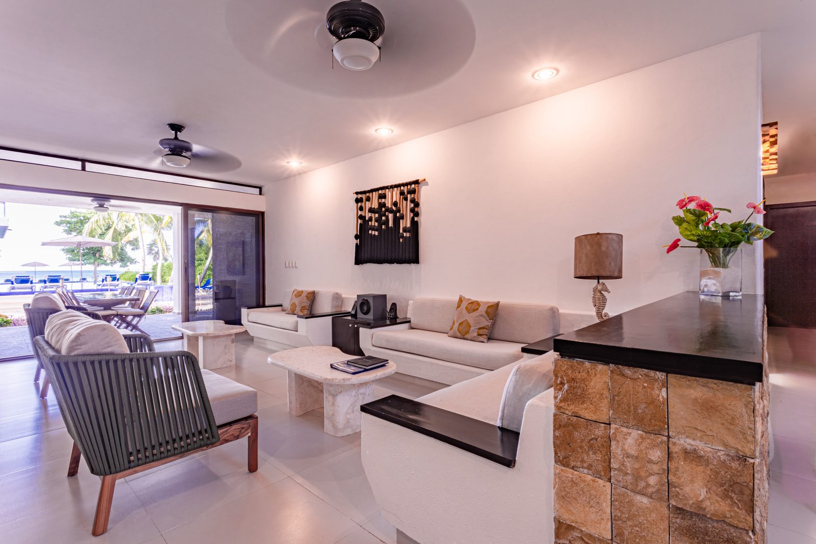Living room opening onto the pool