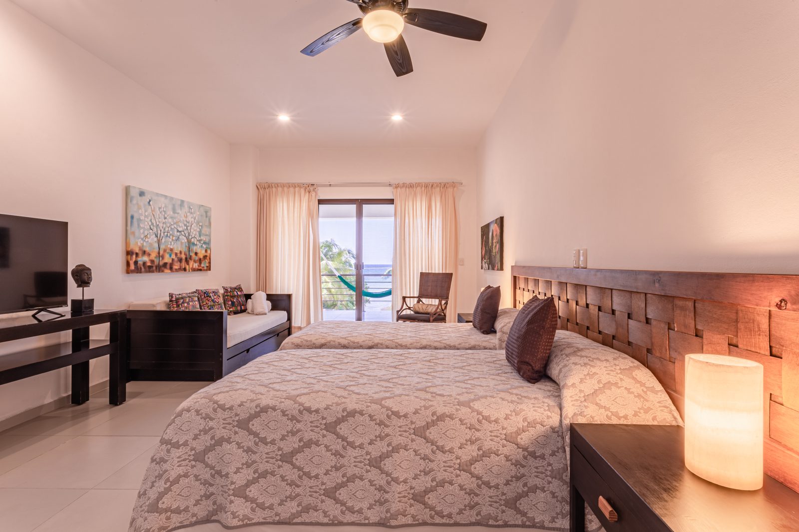 Bedroom with an ocean-view balcony