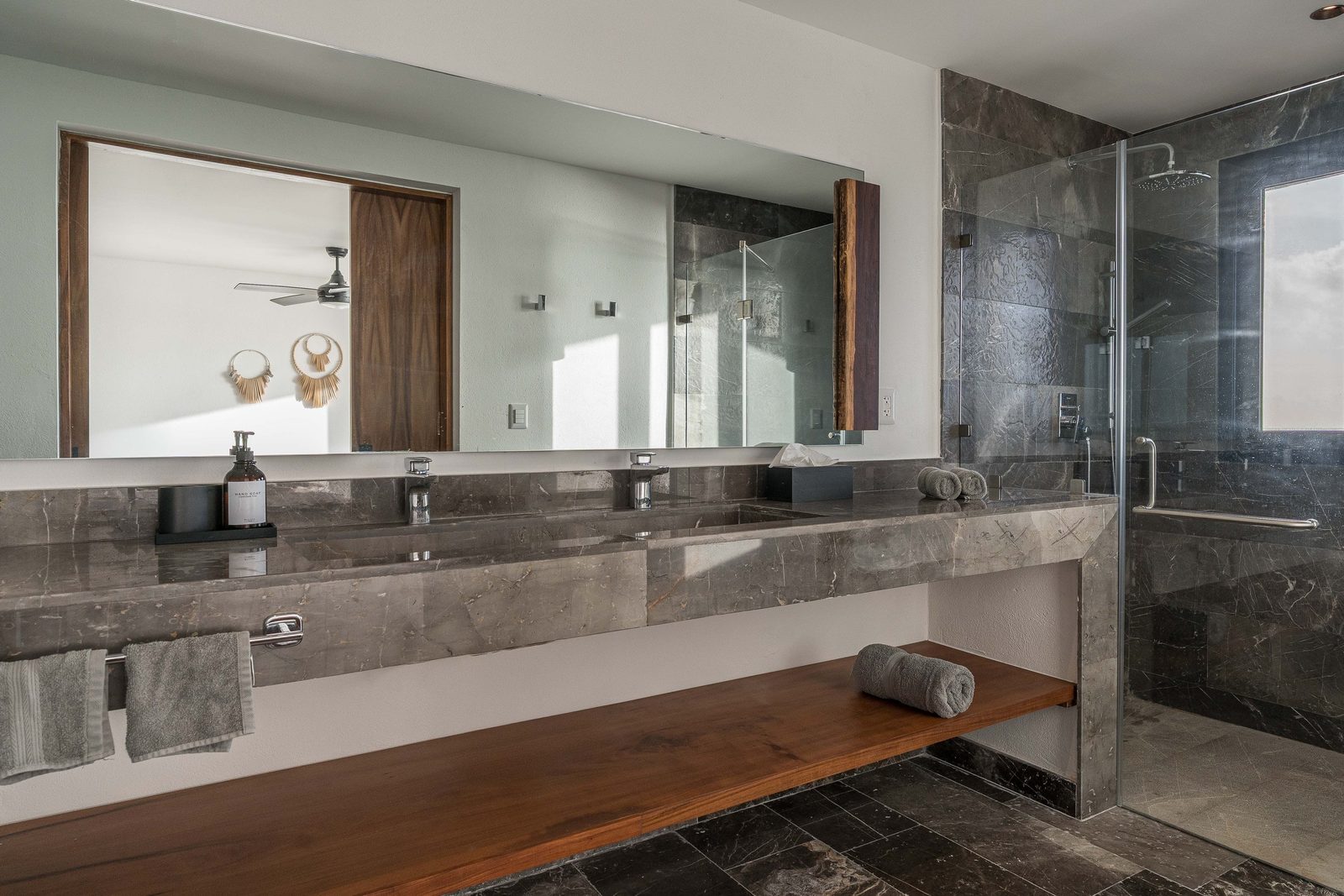 Bathroom with a double vanity and glass shower