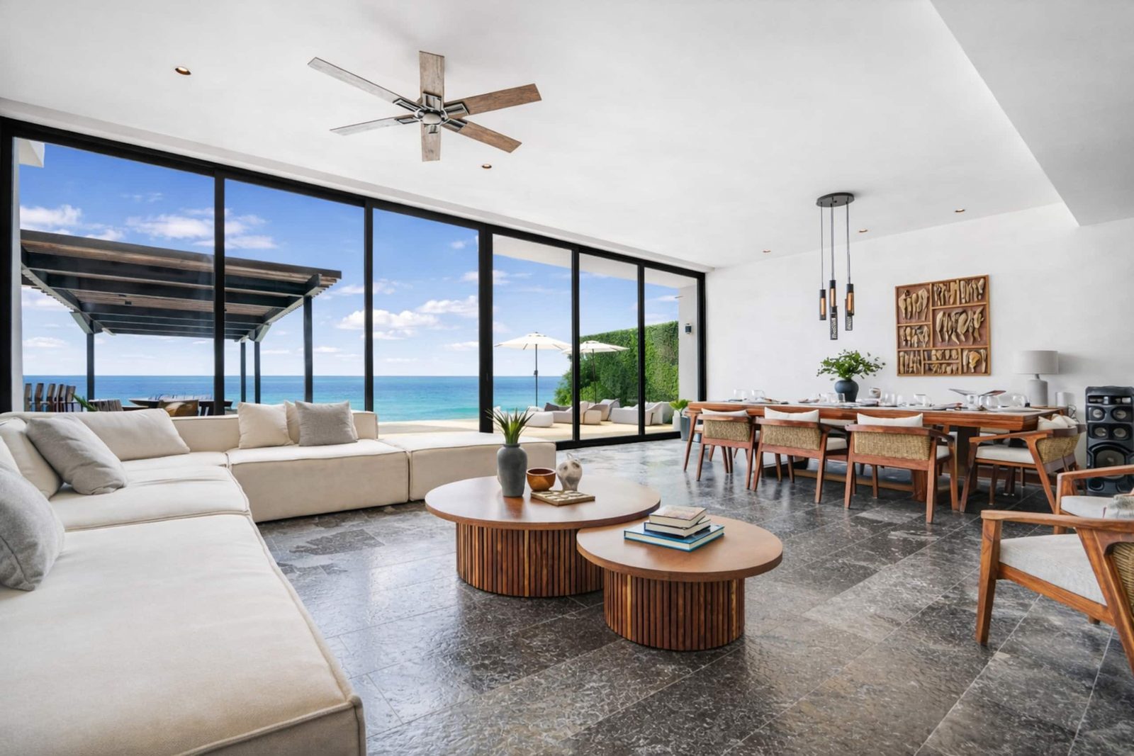 Living room with floor-to-ceiling windows to the sea