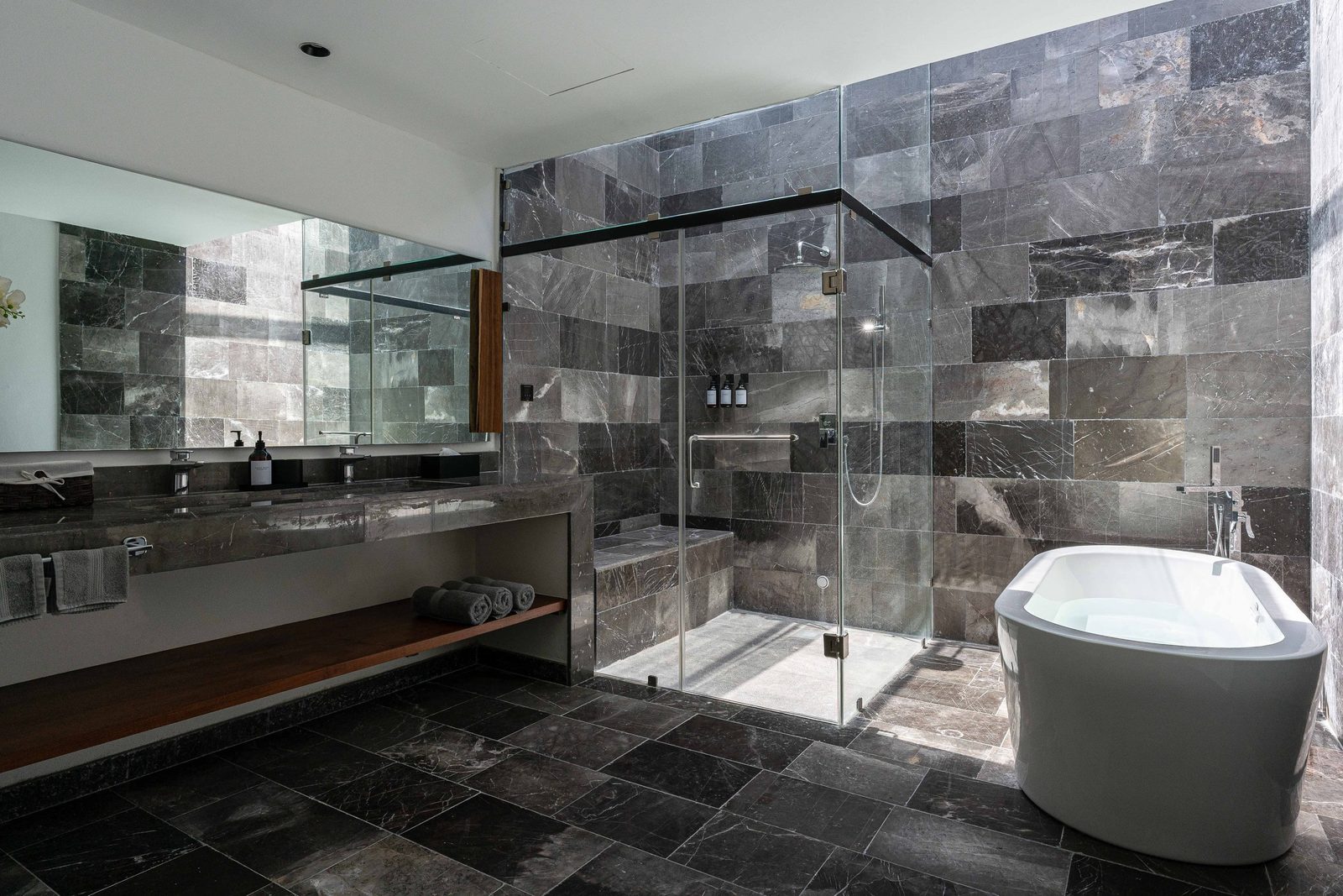 Bathroom with a freestanding tub and walk-in shower