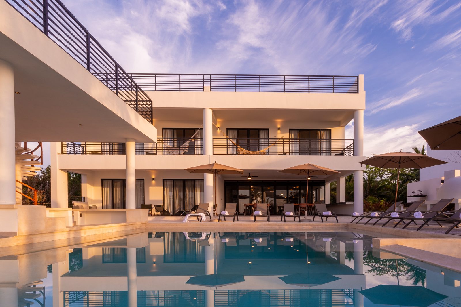 The house reflected in the pool