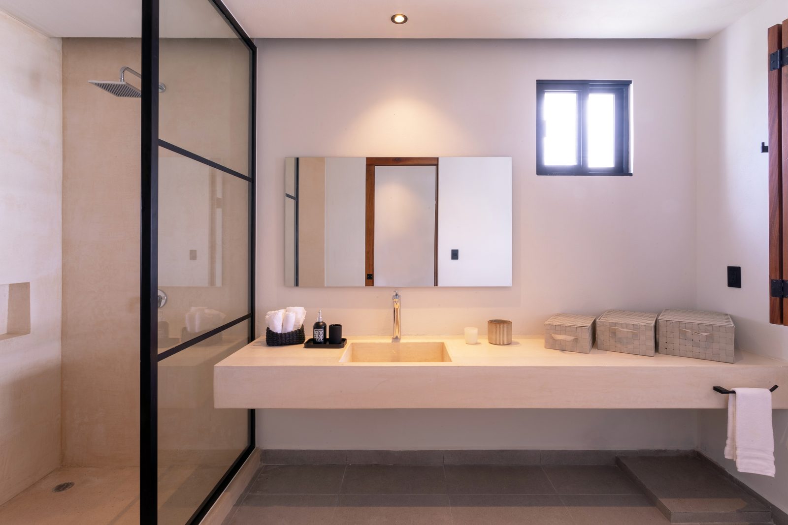 Bathroom with vanity and rain shower