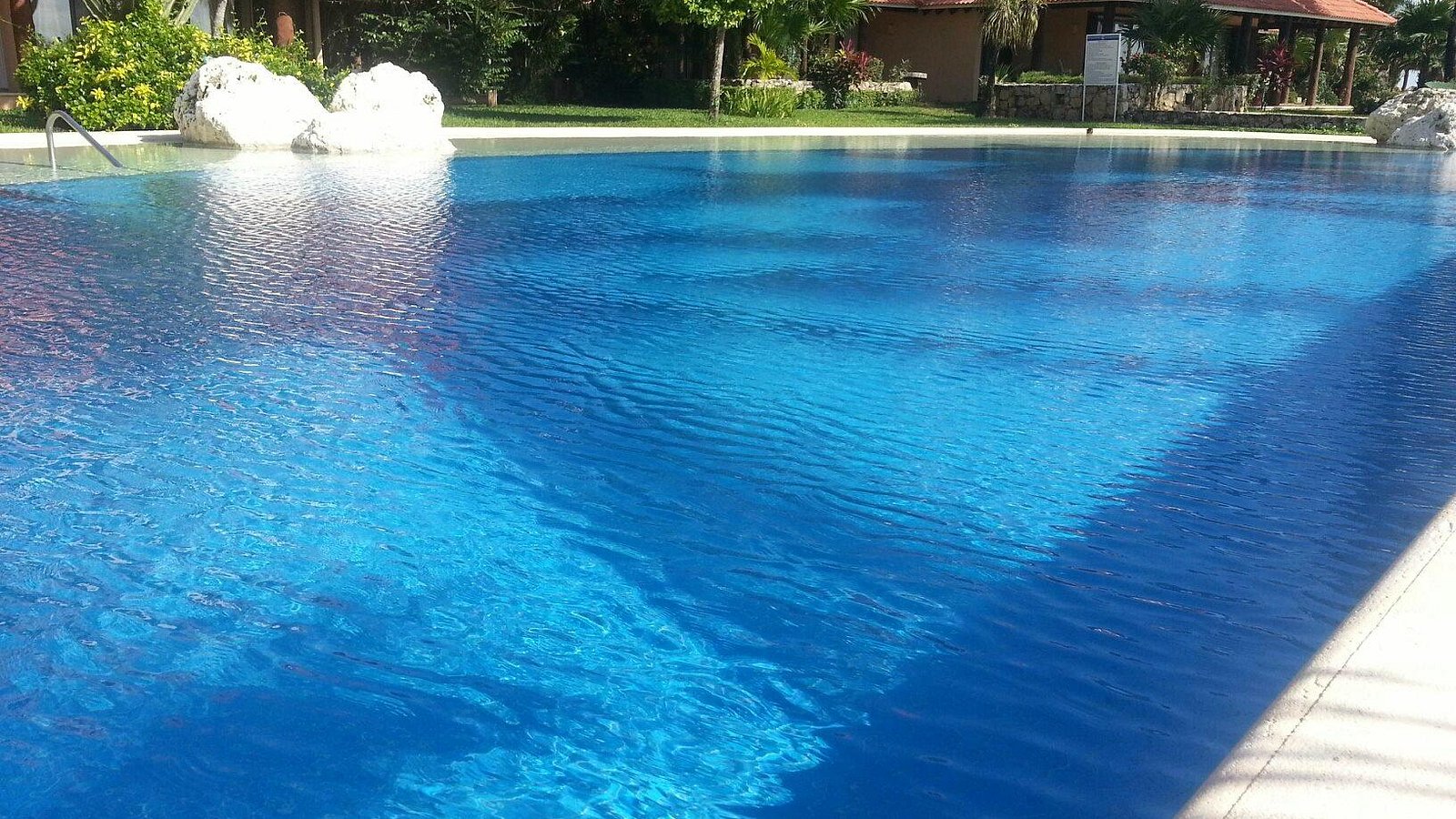 The large blue pool in the gardens