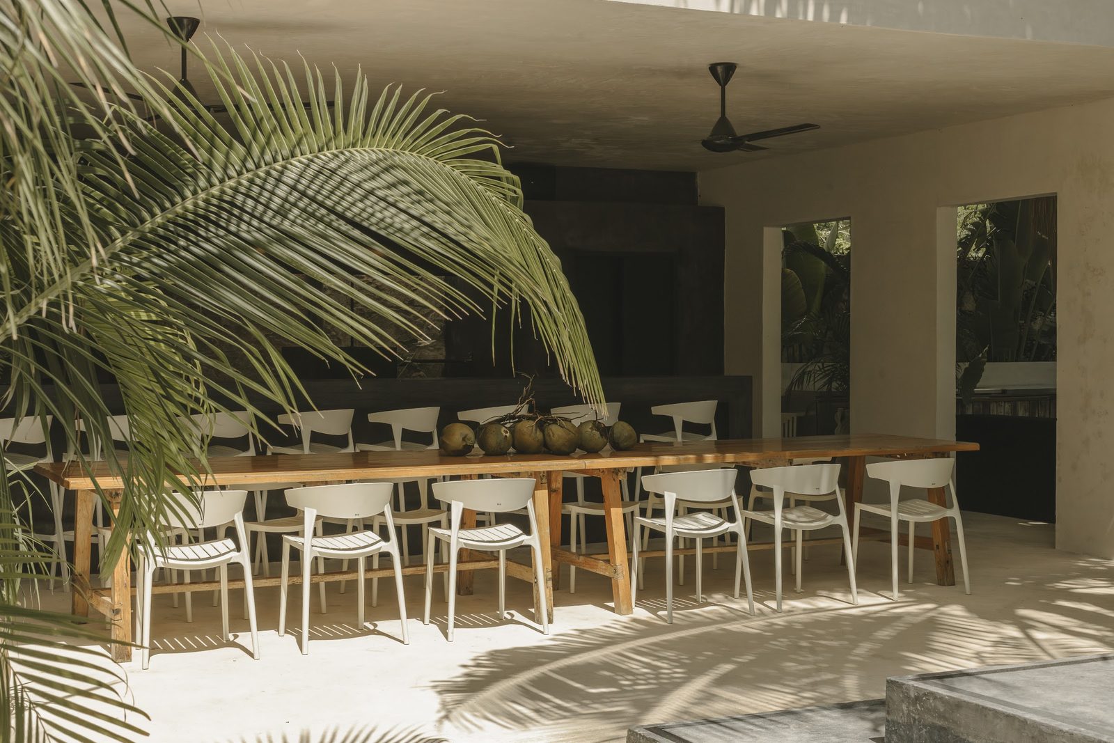 The long table under the covered terrace, set for the whole group