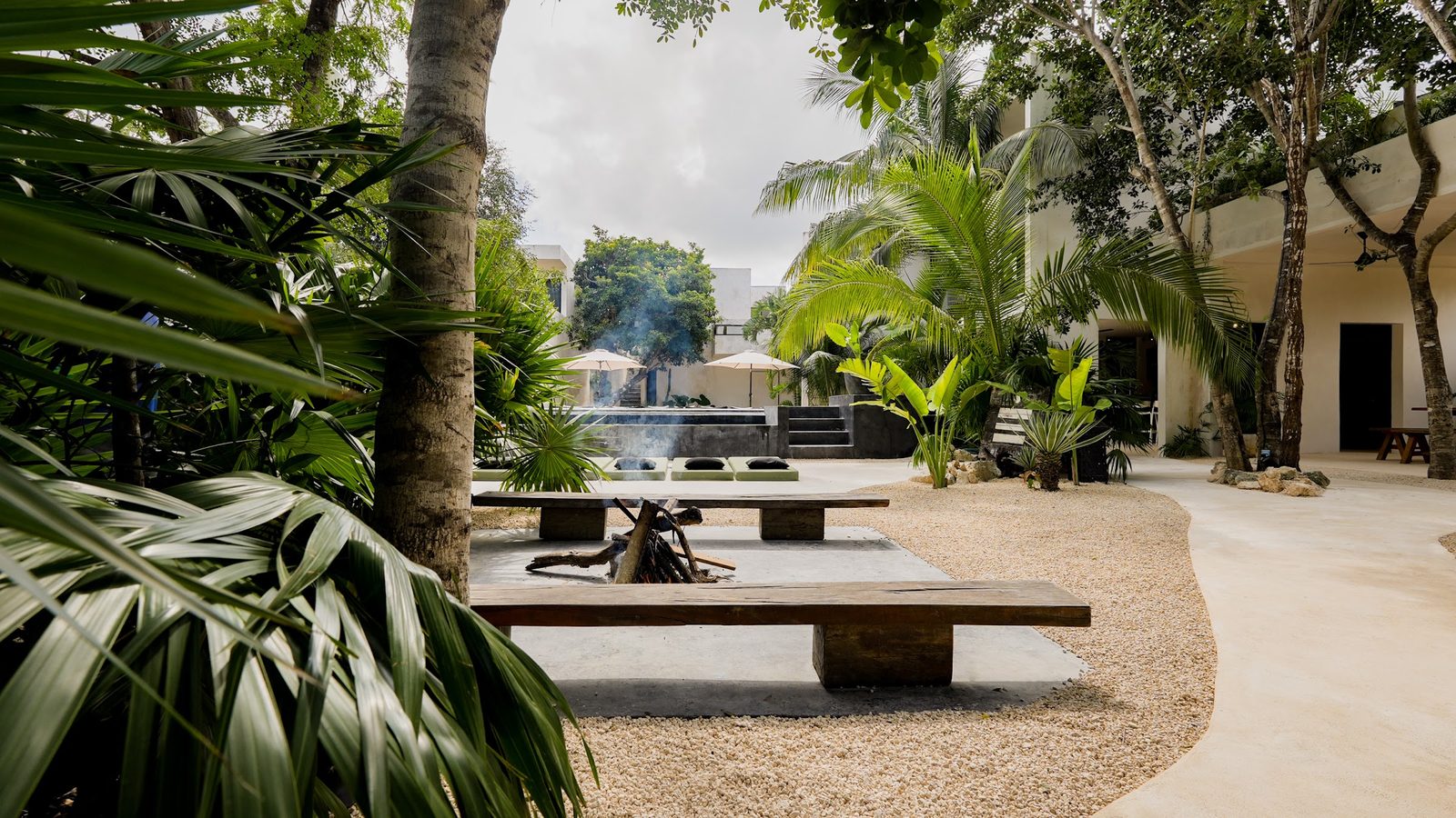 The fire pit and the lounge in the garden