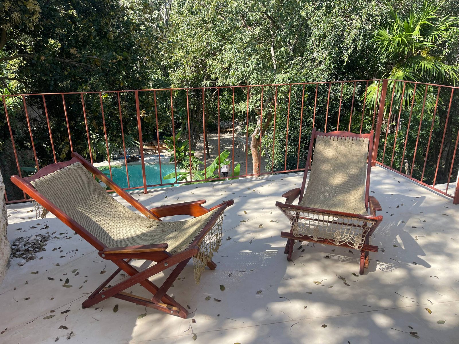 The rooftop terrace with loungers above the pool