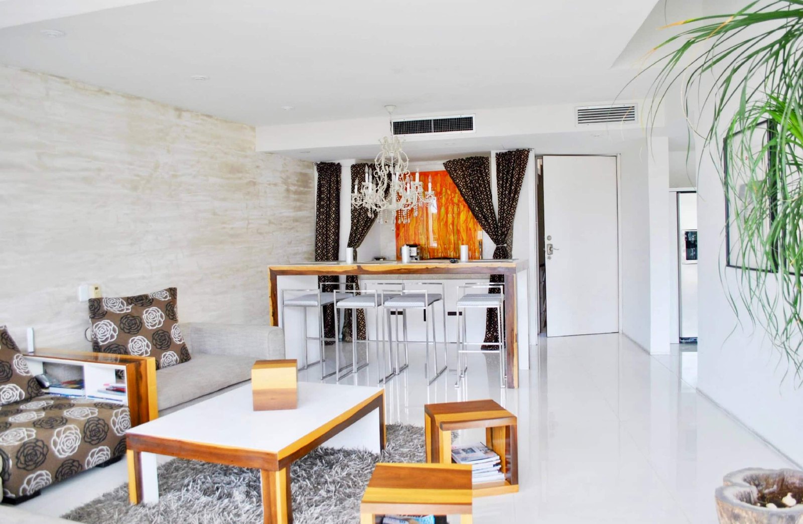 Bright living room with a bar