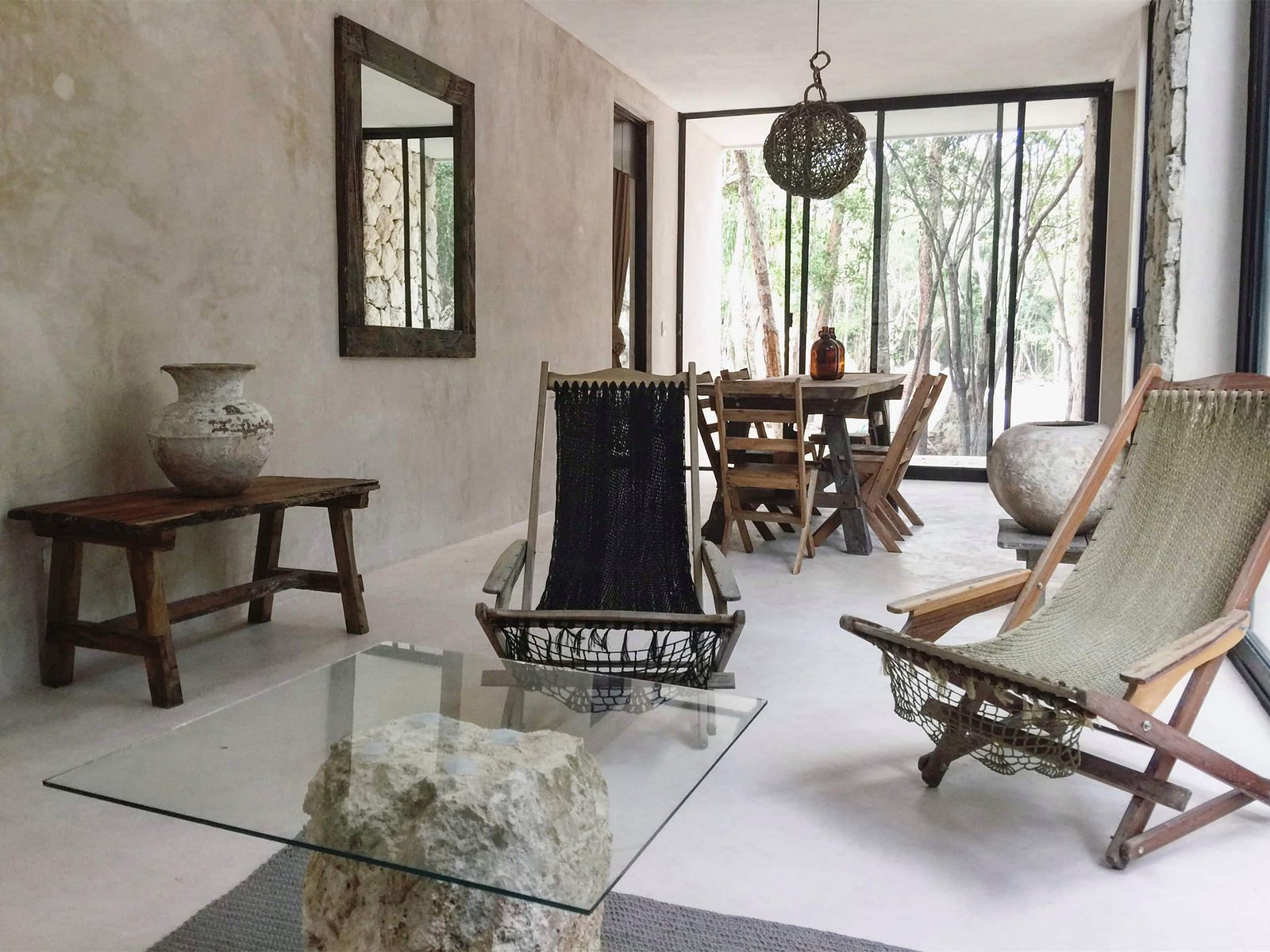 One of the two ground-floor living rooms, with hammock chairs
