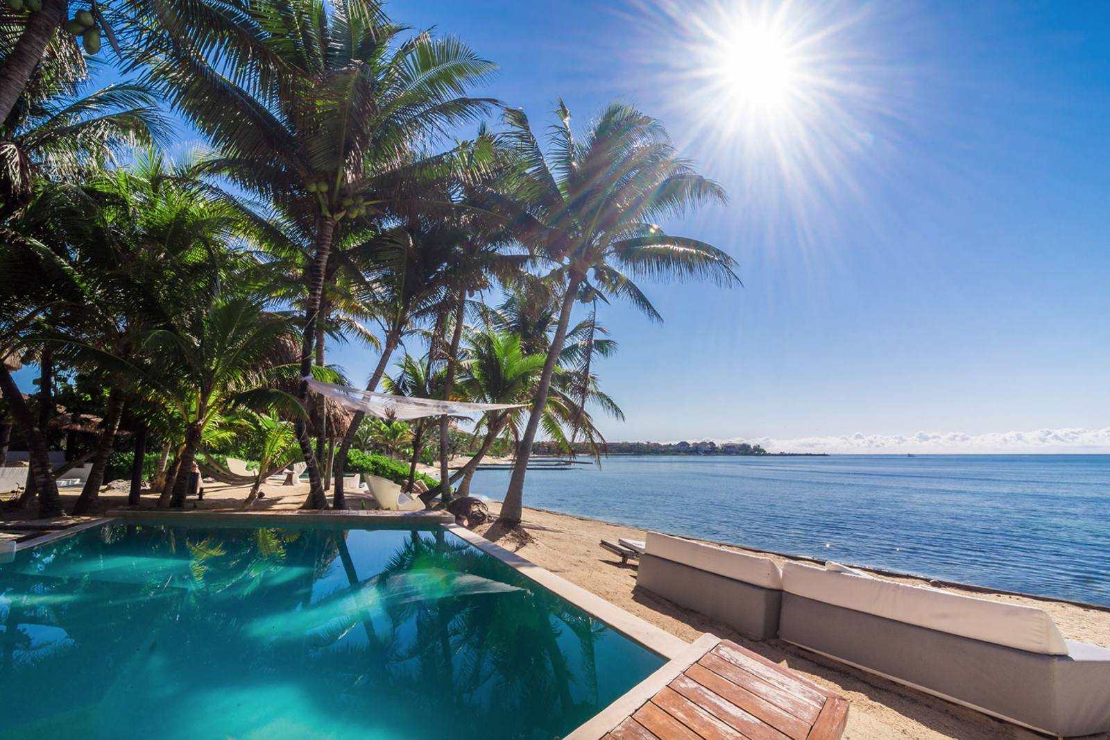 The pool at the edge of the beach, facing the sea
