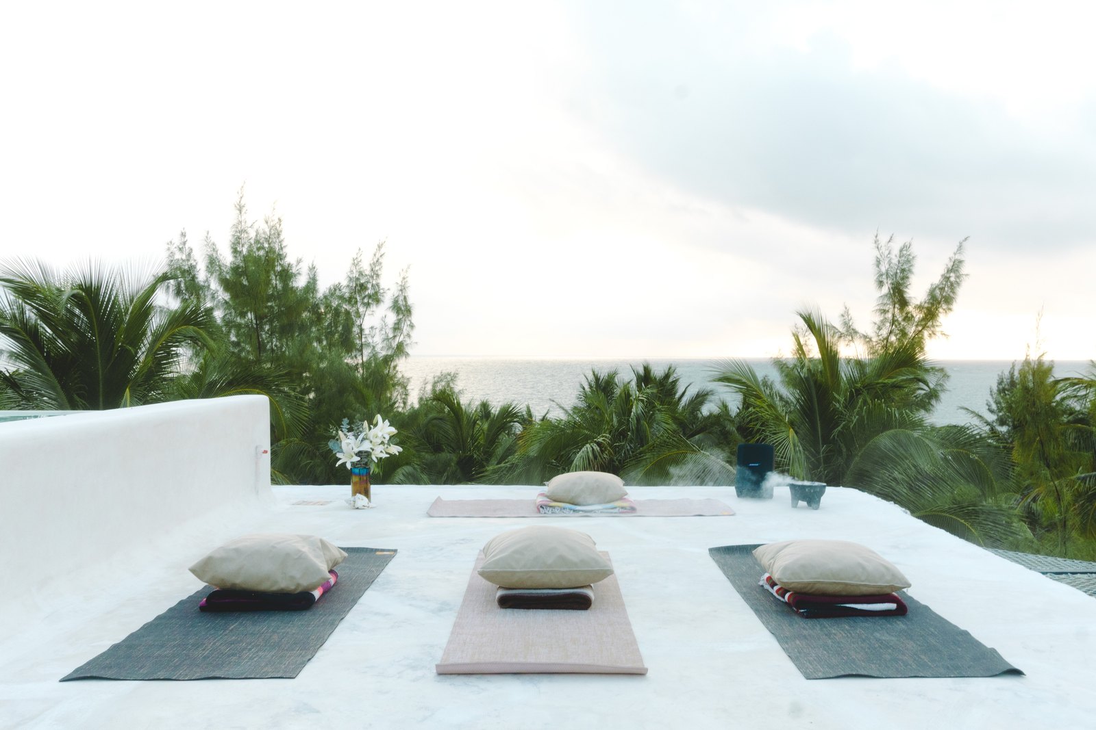 Yoga mats on the rooftop terrace, facing the sea