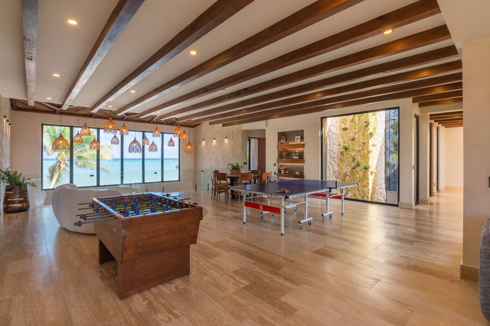 The game room with foosball and ping-pong