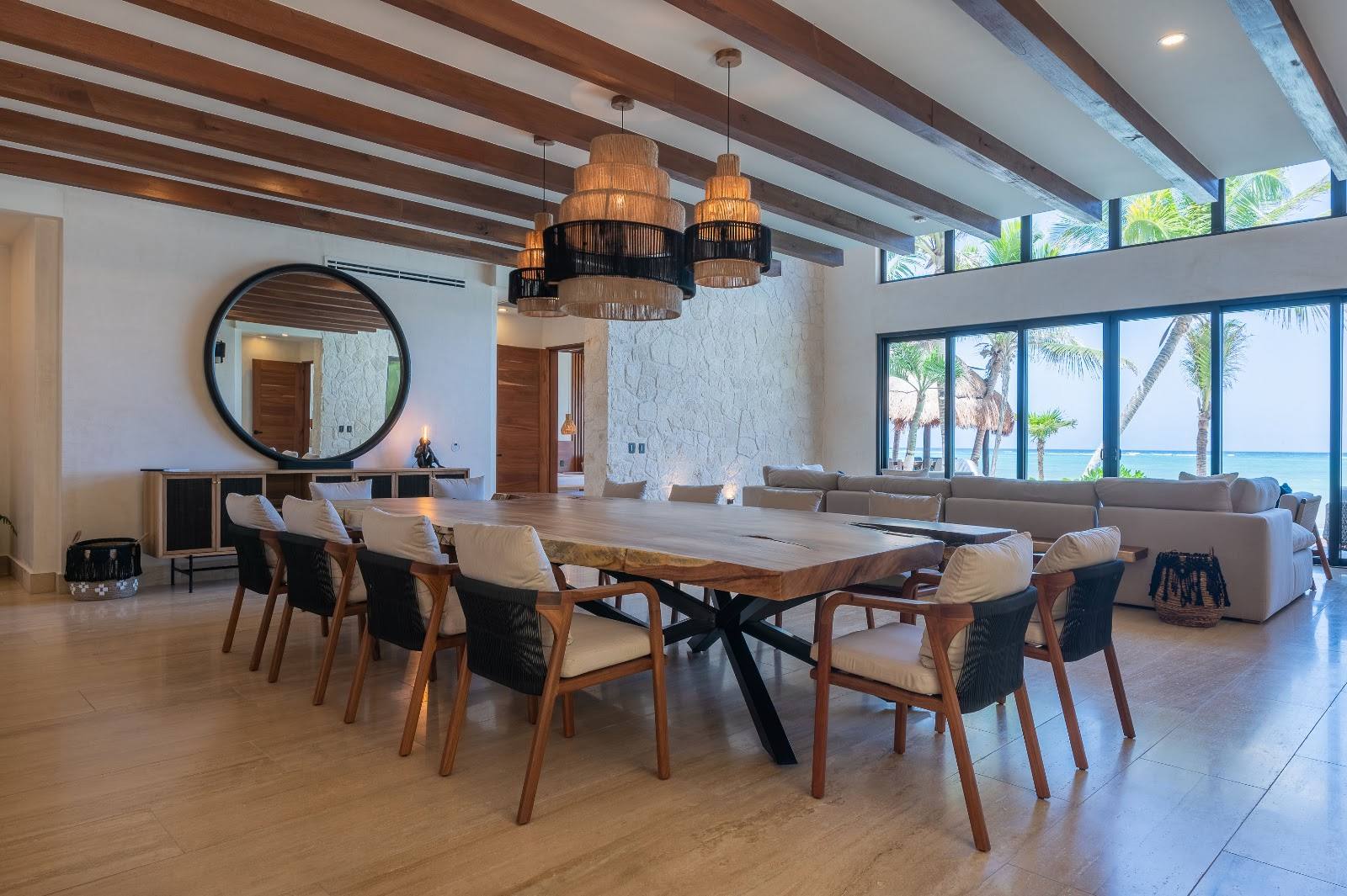The dining table and living room with sea views